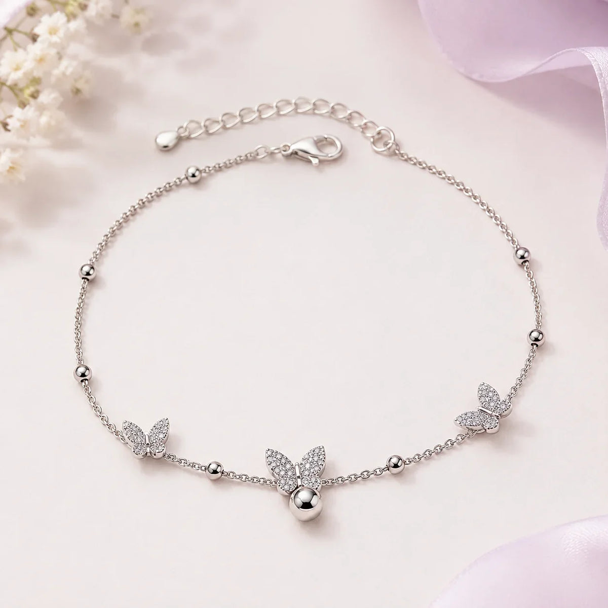 Butterfly & Bell Charm Bracelet