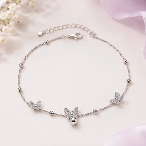 Butterfly & Bell Charm Bracelet