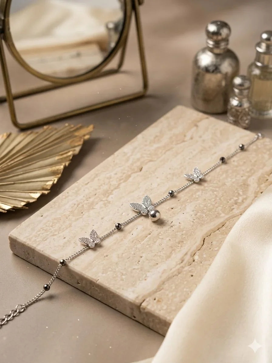 Butterfly & Bell Charm Bracelet