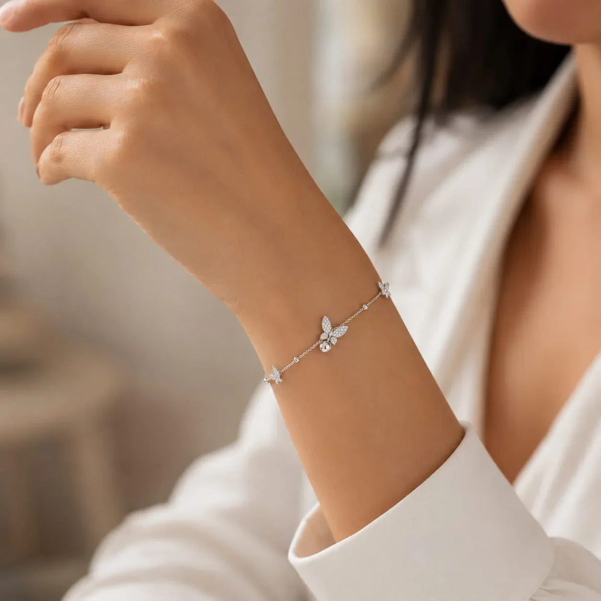 Butterfly & Bell Charm Bracelet